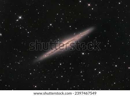 The Outer Limits Galaxy also known as the Silver Sliver Galaxy. A great example of an edge on galaxy located 30 million light years away.