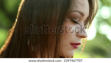 Pretty hispanic millennial woman face portrait looking to camera