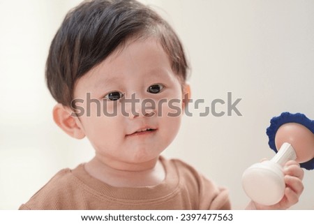 Cute baby playing with toys