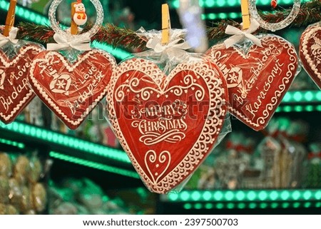Merry Christmas sign on a heart shape gingerbread in the Christmas market in Budapest, Hungary. 