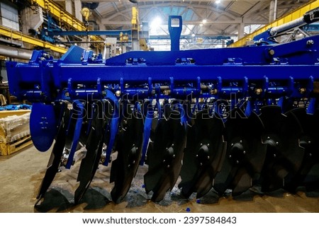 Modern manufactured agricultural disk cultivator in factory