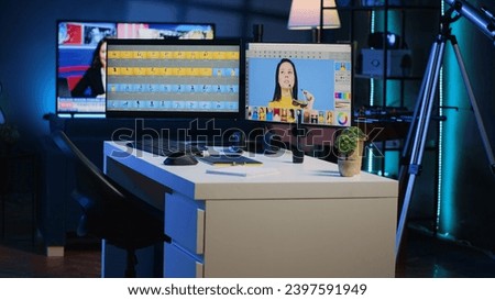 Media company creative office with multi monitors setup used for post processing retouching of images. Editing software interface on computer screens in professional graphic design workspace
