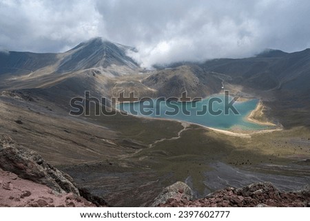 View of Volcano Nevado de Toluca National park with lakes inside the crater in Mexico in the blue sky - landscape near of Mexico City - Xinantecatl