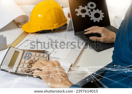 Engineer Troubleshooting and Management,House plans, construction business and real estate Royalty-Free Stock Photo #2397614015