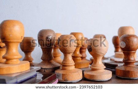 collection of wooden stamps and ink on a white background