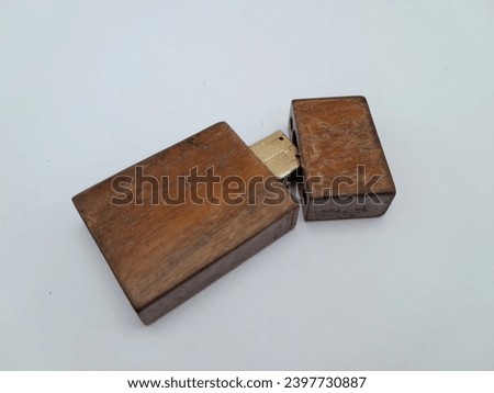 flasdisk made of wood with a white background