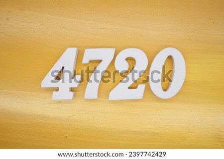 The golden yellow painted wood panel for the background, number 4720, is made from white painted wood.