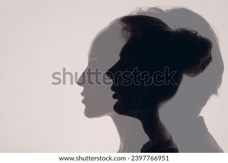 Love of couple young man and woman double exposure silhouettes Royalty-Free Stock Photo #2397766951