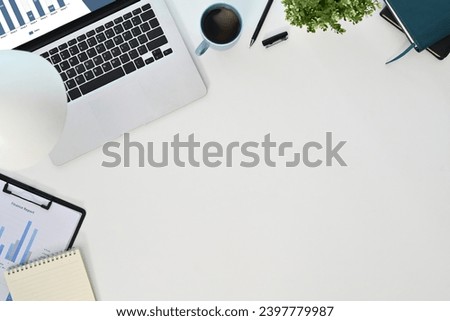 Top view laptop computer, coffee cup, document and coffee cup on white background