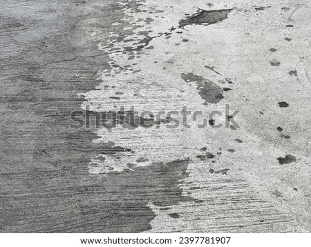 the texture of the concrete floor is very dirty.