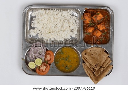 Veg Thali with chapati, roti, poli, bhat, rice, panner, paneer bahji, bhaji, salad, curry and salad Royalty-Free Stock Photo #2397786119