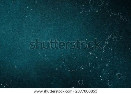 Blue textured aged stone background. Top view. On a dark background. Free space for text.