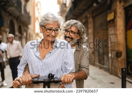 joy and happiness for an adult married couple having fun traveling on the same bicycle having a fun Valentine's Day - Valentine's Day concept