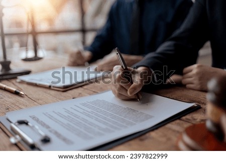 Legal execution department makes an appointment with the customer to sign a mediation agreement to pay the debt. Lawyer discuss the contract document. Treaty of the law. Sign a contract business. Royalty-Free Stock Photo #2397822999