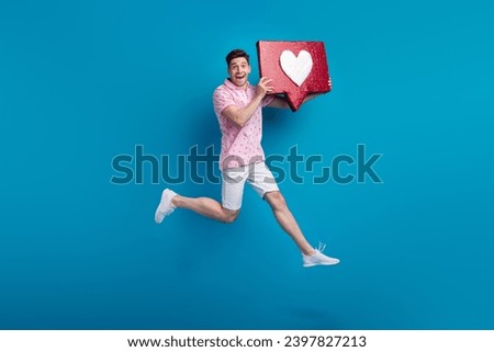 Full size photo of overjoyed impressed man jump hands hold like notification collage isolated on blue color background