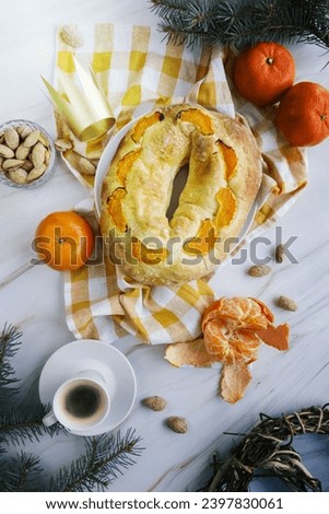 Top view epiphany day dessert with spruce oranges Royalty-Free Stock Photo #2397830061