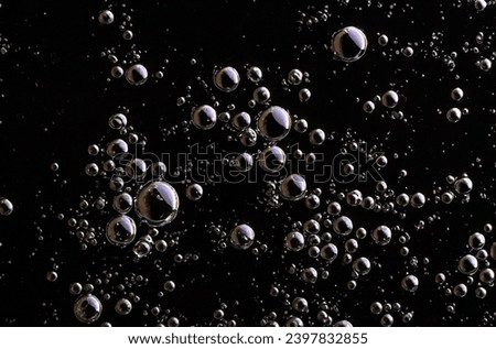 Water or oil Bubbles isolated on black background 