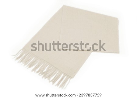 Cold weather muffler on a white background Royalty-Free Stock Photo #2397837759