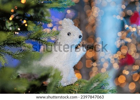 New Year's decorations, toys and garlands in fabulous settings. Toy animals for children in a public place.