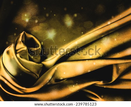 Expensive flashing gold silk background.
