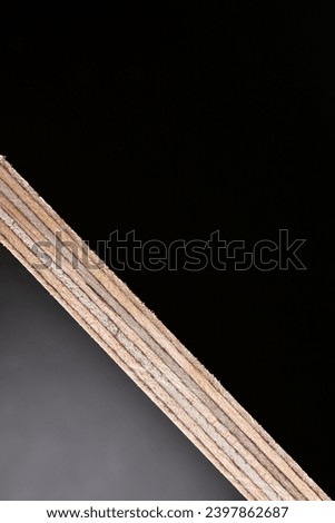 plywood edge black background copyspace industrial. High quality photo
