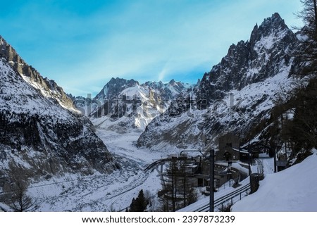 Mont Blanc is the highest mountain in the Alps and the highest in Europe. Beautiful panorama of European Alps in sunny day. Fantastic snow mountains landscape banner background. Mountain peaks. 