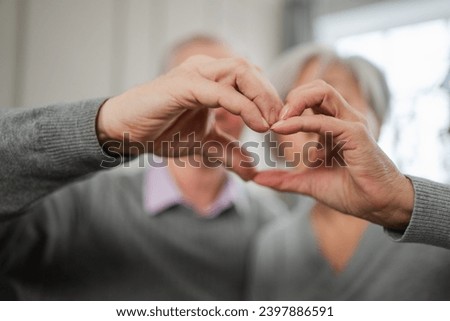 Love heart shape peace. Senior older couple making heart shape with their hands. Adult mature old husband wife showing heart sign. Happy pensioner family. I love you happy valentines day Royalty-Free Stock Photo #2397886591