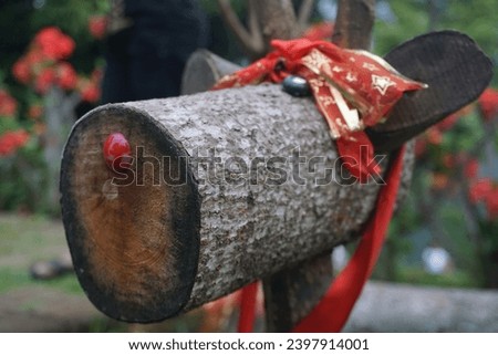 
wooden horse with Chinese New Year decorations