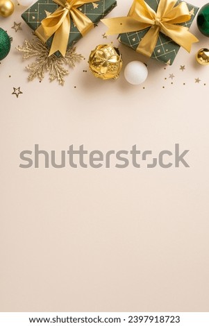 Opulence and festive spirit on Christmas theme. Overhead vertical shot of elegantly packaged gifts, opulent ornaments, snowflake, golden sequins on soft beige backdrop with space for greeting or promo