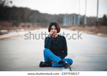 Portrait of beautiful asian chic girl pose for take a picture,Lifestyle of teen thailand people,Modern woman happy concept,Punk rock style