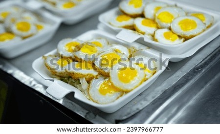 Picture of quail egg snack which is a popular street food menu in Thailand Because it can be eaten by both children and adults. Looks like a fried egg but smaller