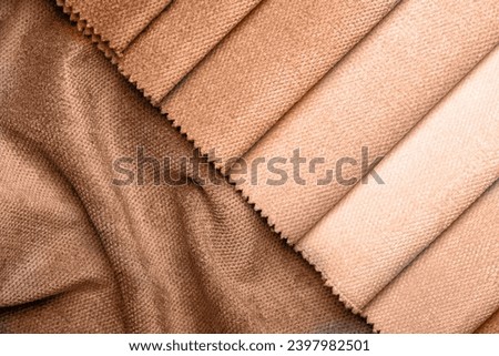 different types of fabrics with a color palette. New trending PANTONE 13-1023 Peach Fuzz colour of 2024 year 