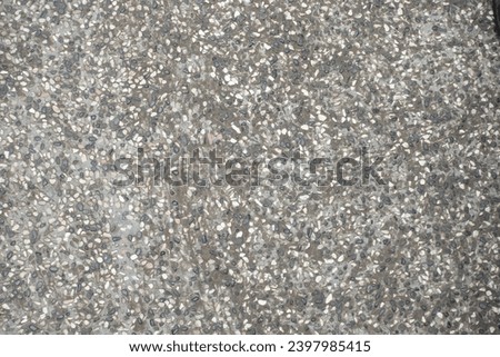 Floor texture with small natural stone patterns