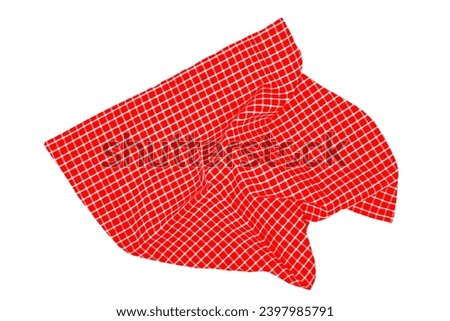 Closeup of a red and white checkered napkin or tablecloth texture isolated on white background. Clipping path. Kitchen accessories. Top view. Royalty-Free Stock Photo #2397985791