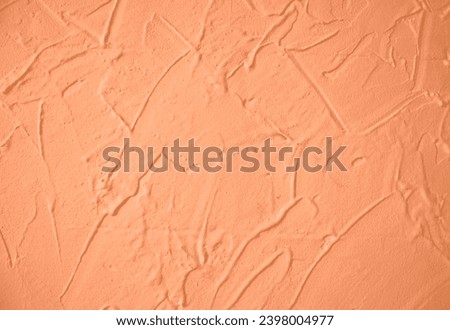 Peach Fuzz toned colour grunge decorative wall background. Art rough stylized texture banner trendy color 2024. Grunge Peach Fuzz color texture Royalty-Free Stock Photo #2398004977