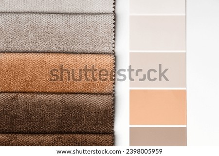 different types of fabrics with a color palette. New trending PANTONE 13-1023 Peach Fuzz colour of 2024 year 