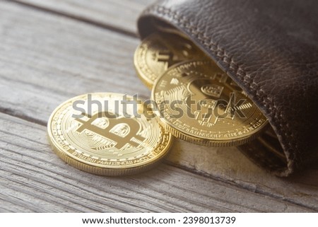 A wallet full of bitcoins, table, wood, hd