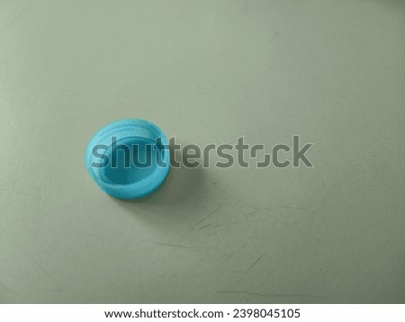 Blue bottle cap with space