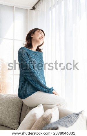 young attractive asian woman relaxing