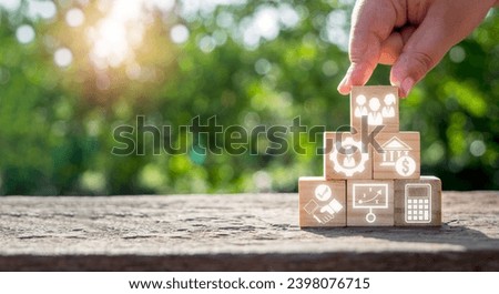 ESOP, Employee stock ownership plan concept, Man hand holding wooden block with employee stock ownership plan icon on virtual screen, business, financial, investment, economy.