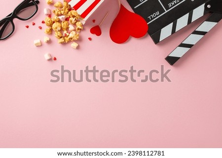 Love-filled movie magic. Top view snapshot of clapperboard, 3D glasses, striped popcorn container, heart-shaped ornaments, marshmallows, sprinkles on charming pastel pink surface with space for text