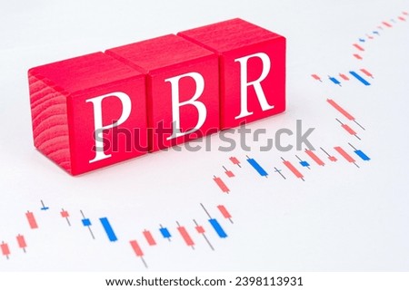 A technical term of PBR on wooden cubes on the candle chart, Price Book-value Ratio, Finance or stock background, Economy