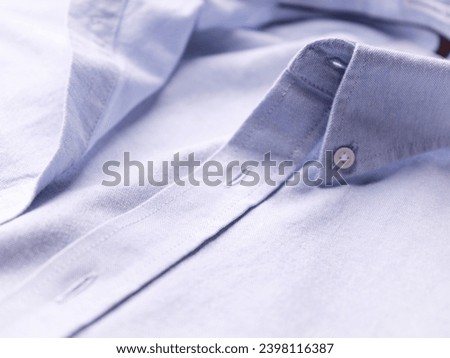 Close up of linen shirt. Soft focus.  Copy space.  Royalty-Free Stock Photo #2398116387