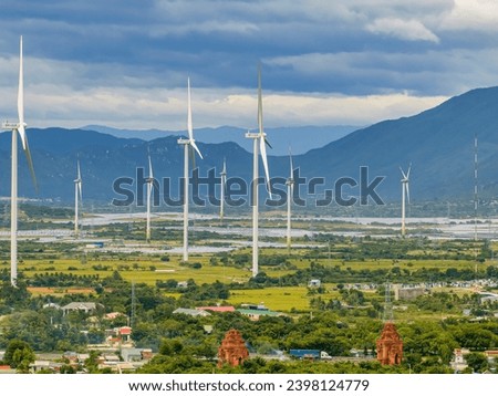 Wind Turbines And Solar Panels At Sunset - Renewable Energy Concept. Ninh Thuan, Vietnam