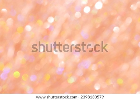 Abstract bokeh background peach colored, natural glare from lights, trend color year 2024 peach fuzz monochrome photo, gradient color, blurred bokeh texture as Glittering aesthetic textured pattern Royalty-Free Stock Photo #2398130579