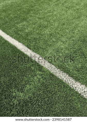 Synthetic grass fifa standard football stadium  Royalty-Free Stock Photo #2398141587