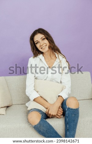 Portrait of a beautiful young stylish woman 30 years old Royalty-Free Stock Photo #2398142671