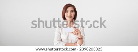 Happy blond woman showing blank credit card. Banner