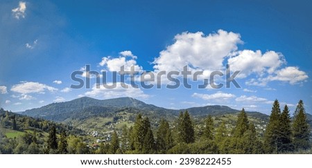 Panoramic image of mountain landscape in winter in the Carpathian mountains