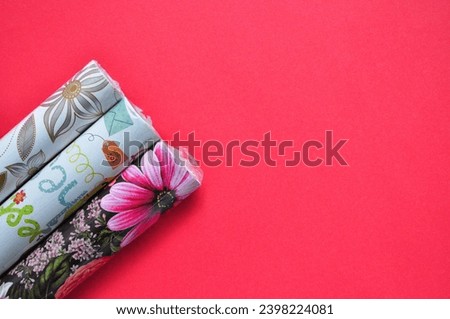 wrapping paper on the red background 